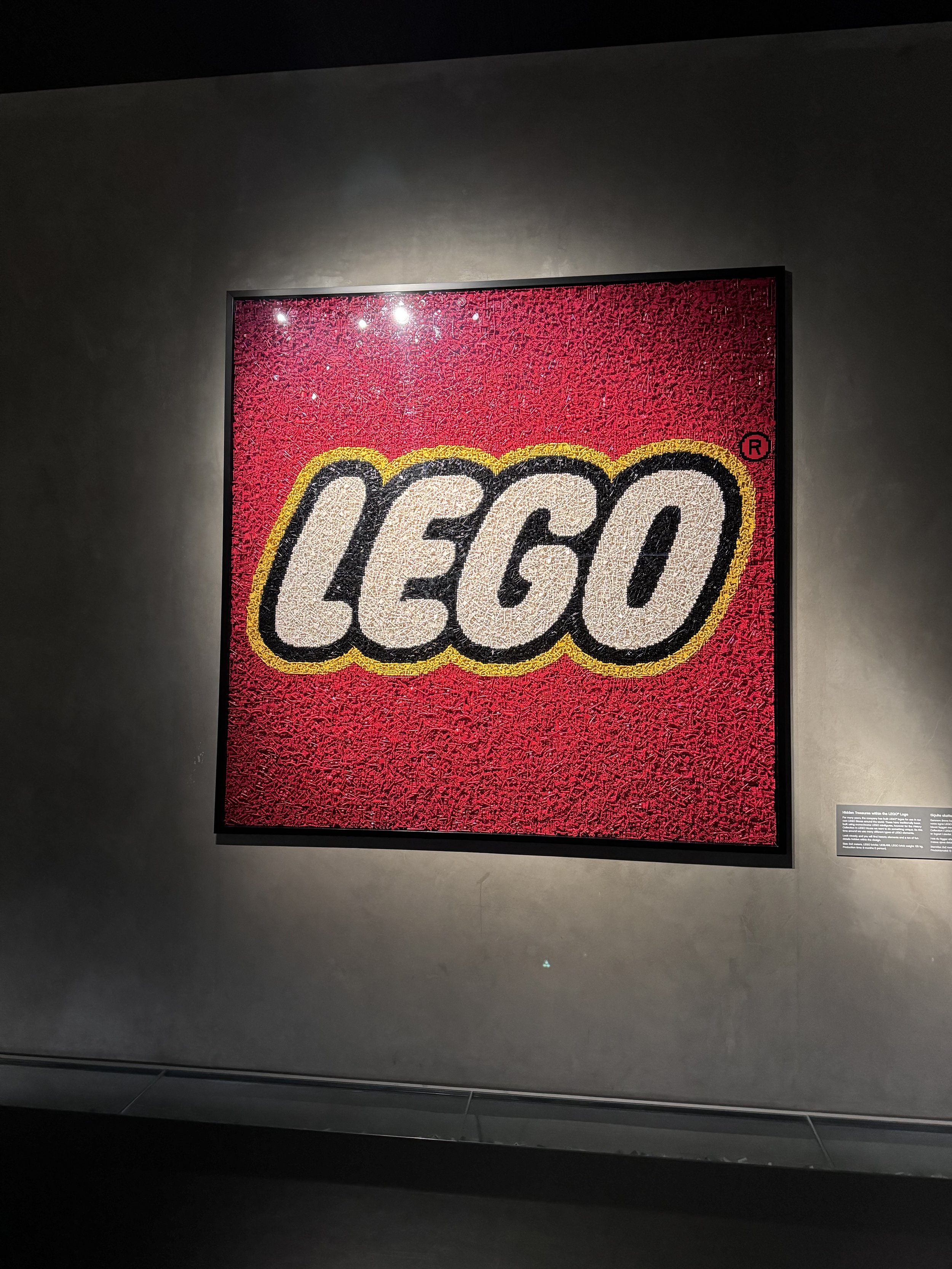 A LEGO House exhibit: the LEGO logo built from thousands of tiny LEGO pieces.