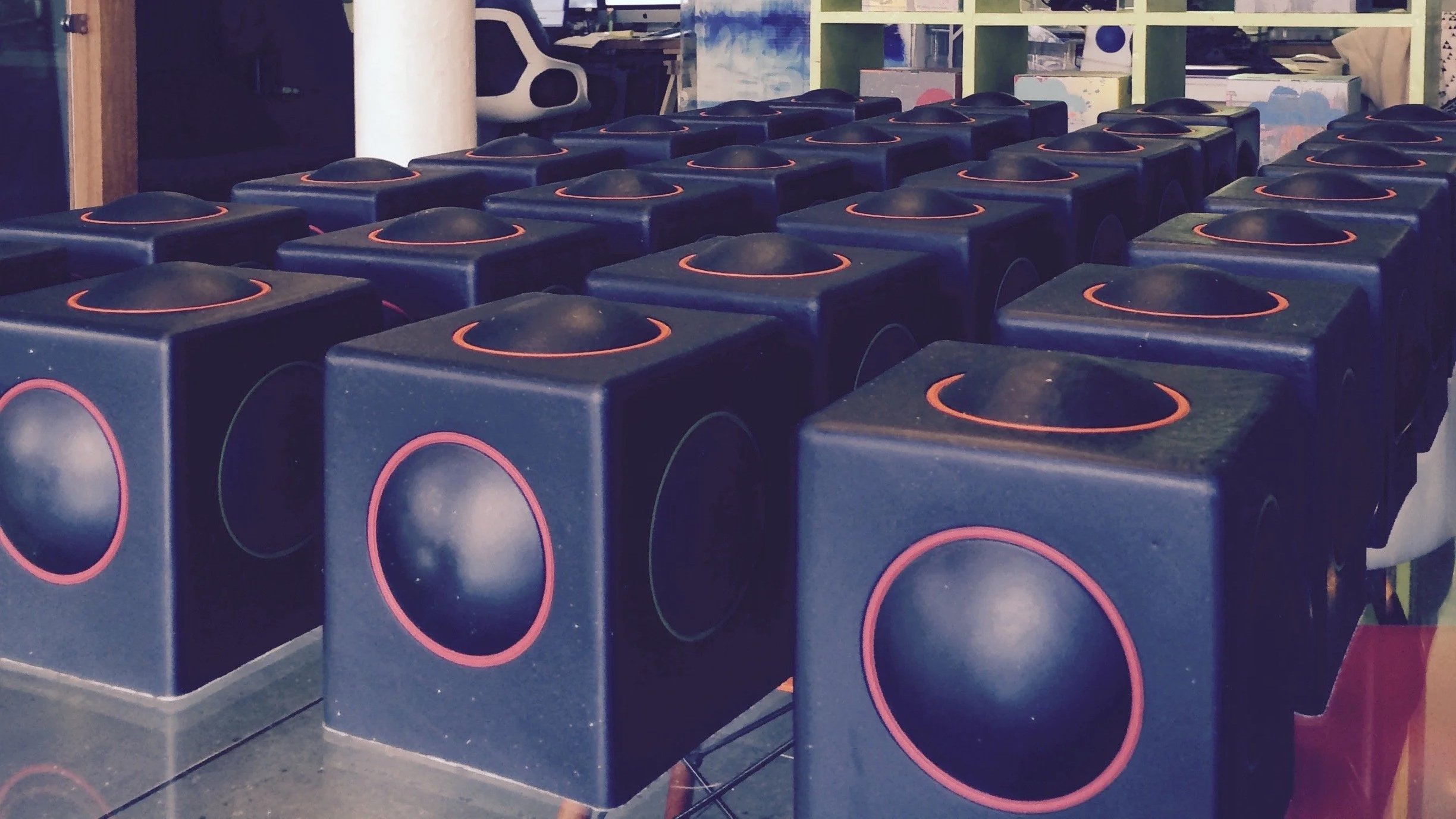 Rows of Skoog instruments, the accessible music controller we designed and manufactured.